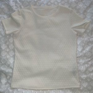 Ivory quilted top, elegant and comfortable